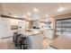 Large kitchen island features bar stool seating and abundant counter space at 168 Morgan Se Ln, Port Charlotte, FL 33952