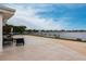 Exterior patio with furniture and a waterfront view at 168 Morgan Se Ln, Port Charlotte, FL 33952