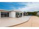 Exterior patio with seating area, perfect for enjoying the outdoors at 168 Morgan Se Ln, Port Charlotte, FL 33952