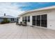 Exterior patio with sliding glass doors at 168 Morgan Se Ln, Port Charlotte, FL 33952