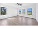 Bright bedroom with sleek flooring and large windows offering natural light and scenic views at 17013 Alpenhorn Ct, Punta Gorda, FL 33955