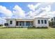 Beautiful home exterior with well-maintained lawn and mature landscaping at 17013 Alpenhorn Ct, Punta Gorda, FL 33955