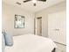 Bedroom featuring a ceiling fan, bright windows, and closet for ample storage at 17261 Naiad Ct, Punta Gorda, FL 33955