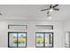 Bright living room features lots of natural light and glass doors to the backyard at 17261 Naiad Ct, Punta Gorda, FL 33955