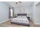 Serene bedroom with coastal-themed decor, soft lighting, and comfortable furnishings at 17288 Acapulco Rd # 411, Punta Gorda, FL 33955