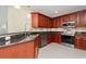 Well-equipped kitchen with sleek appliances, granite countertops, and plenty of cabinet space at 17288 Acapulco Rd # 411, Punta Gorda, FL 33955