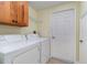 Laundry room features a front-load washer and dryer at 17288 Acapulco Rd # 411, Punta Gorda, FL 33955
