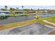 Aerial view overlooking a canal community with boats docked at private residences at 1756 Boca Raton Ct, Punta Gorda, FL 33950