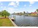 This canal view highlights the waterfront lifestyle with docks and easy water access at 1756 Boca Raton Ct, Punta Gorda, FL 33950