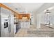 Modern kitchen features stainless steel appliances, granite countertops, and ample cabinet space at 1756 Boca Raton Ct, Punta Gorda, FL 33950