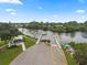 Aerial view showing community boat ramp and docks, perfect for boating, fishing and watersport enthusiasts at 215 Schooner St, North Port, FL 34287