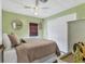 Relaxing bedroom featuring a comfortable bed, closet space, and ample natural light at 215 Schooner St, North Port, FL 34287