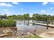 Waterfront boat ramp with a heron nearby offering water access and nature viewing at 215 Schooner St, North Port, FL 34287