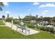 Enjoy the tranquil waterfront with community docks, benches, and lush landscaping at 215 Schooner St, North Port, FL 34287
