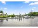 Community dock with boat slips and waterfront access, offering a convenient amenity for residents at 215 Schooner St, North Port, FL 34287