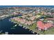 Aerial view of the community featuring waterfront condos and boat docks with stunning water views at 2645 W Marion Ave # 114, Punta Gorda, FL 33950
