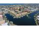 Stunning aerial view of the waterfront community featuring boat docks, condos, and beautiful waterways at 2645 W Marion Ave # 114, Punta Gorda, FL 33950