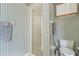 Bathroom featuring shower, toilet, and neutral hand towels at 2645 W Marion Ave # 114, Punta Gorda, FL 33950
