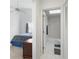 Bedroom with neutral carpet, bedroom and ensuite bath at 2645 W Marion Ave # 114, Punta Gorda, FL 33950