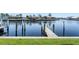 Private dock with sturdy wooden posts offers direct waterfront access, great for boating and enjoying the water at 2645 W Marion Ave # 114, Punta Gorda, FL 33950