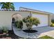 Charming exterior of home #114 with an attached garage and walkway at 2645 W Marion Ave # 114, Punta Gorda, FL 33950