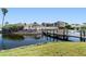 Charming waterfront property features a private dock, lush landscaping, and serene water views at 2645 W Marion Ave # 114, Punta Gorda, FL 33950