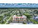Stunning aerial view of the community, surrounding landscape and distant waterways at 3006 Caring Way # 329, Port Charlotte, FL 33952