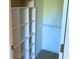 Organized closet with built-in shelving and hanging rod for optimal storage at 3006 Caring Way # 329, Port Charlotte, FL 33952