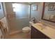 Clean bathroom featuring a tiled shower with glass door and modern vanity at 32 Bariloche Dr, Punta Gorda, FL 33983
