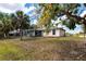 Backyard showing the lanai, yard, and home's rear exterior at 3436 Discovery Dr, Punta Gorda, FL 33983