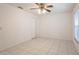 Neutral bedroom features tile floors, natural lighting, and a closet at 3436 Discovery Dr, Punta Gorda, FL 33983