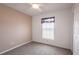 Bedroom featuring neutral carpet, a window with blinds, a ceiling fan, and a closet at 3436 Discovery Dr, Punta Gorda, FL 33983
