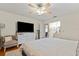 Spacious main bedroom with hardwood floors, and ensuite bathroom at 3956 Fairchild Ave, North Port, FL 34287