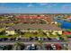 Beautiful aerial view of condo community with lush landscaping and canal access at 4000 Bal Harbor Blvd # 217, Punta Gorda, FL 33950