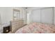 Well-appointed bedroom with closet, a dresser, and a door into an adjacent bath at 4000 Bal Harbor Blvd # 217, Punta Gorda, FL 33950