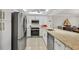 Modern kitchen with stainless appliances and granite countertops offering an open layout at 4000 Bal Harbor Blvd # 217, Punta Gorda, FL 33950