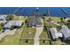 A captivating aerial view of a waterfront property with a dock, and pool at 4450 Northshore Dr, Punta Gorda, FL 33980