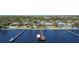 Gorgeous view of waterfront homes with long docks reaching into the tranquil water at 4450 Northshore Dr, Punta Gorda, FL 33980