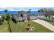 Stunning waterfront home with lush landscaping, three car garage and beautiful water views at 4450 Northshore Dr, Punta Gorda, FL 33980