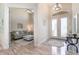 Welcoming foyer with high ceilings, tiled floors, and an adjacent sitting room at 4450 Northshore Dr, Punta Gorda, FL 33980