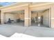 Two-car garage with bright lighting, polished floors, and ample space for vehicles and storage at 4450 Northshore Dr, Punta Gorda, FL 33980