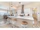Gourmet kitchen with stainless steel appliances and a spacious island with barstool seating at 4450 Northshore Dr, Punta Gorda, FL 33980