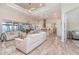 Open-concept living area with modern decor, water views and seamless flow to the kitchen at 4450 Northshore Dr, Punta Gorda, FL 33980