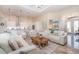 Inviting open-concept living room showcasing a gourmet kitchen, dining area and high ceilings at 4450 Northshore Dr, Punta Gorda, FL 33980