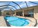 Enjoy the sparkling pool and lanai with waterfront views and outdoor dining at 4450 Northshore Dr, Punta Gorda, FL 33980