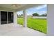 Covered patio area with a view of the expansive backyard at 4517 Meager Cir, Port Charlotte, FL 33948