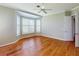 This bedroom offers hardwood floors, crown molding and a large bay window at 629 Misty Pine Dr, Venice, FL 34292