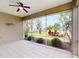 This beautiful screened in lanai has tile floors and a great view of the lawn at 629 Misty Pine Dr, Venice, FL 34292