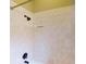 Bright and airy shower space with bronze fixture and neutral tones at 629 Misty Pine Dr, Venice, FL 34292