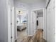 Hallway between bedrooms and bathrooms featuring luxury vinyl flooring at 7081 Waterford Pkwy, Punta Gorda, FL 33950